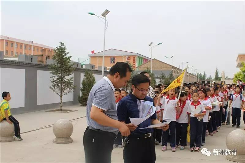 温州市未来教育先行校考察组在景山小学现场考察指导
